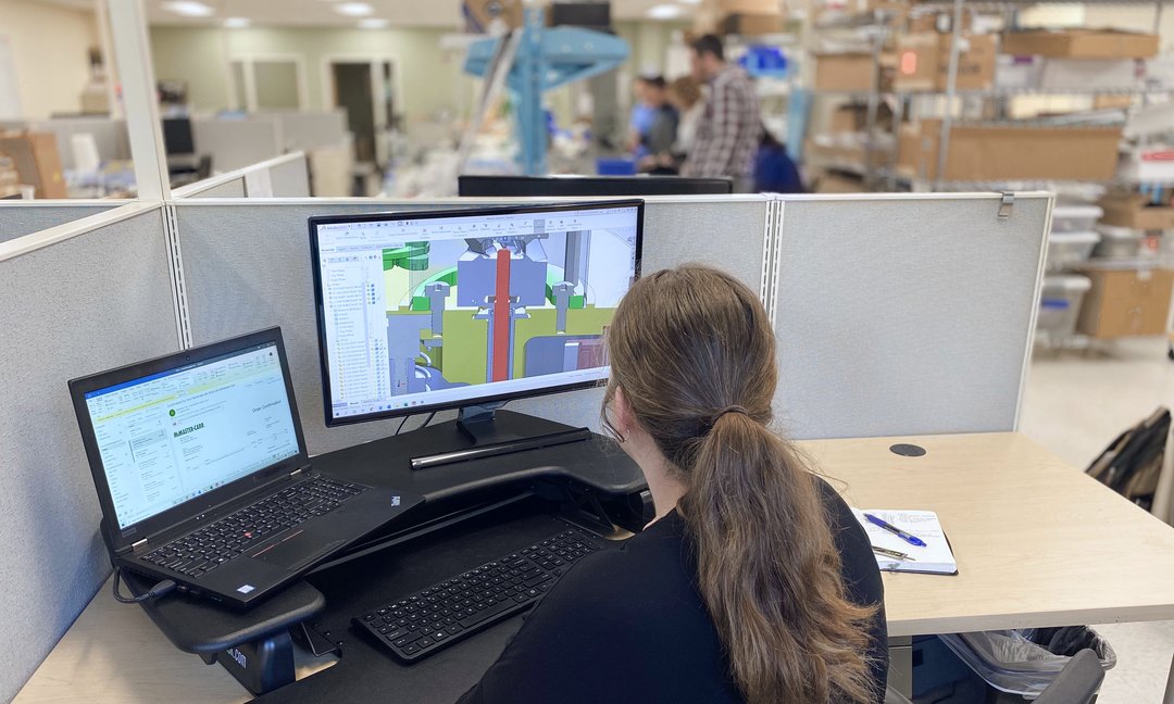 Engineer reviewing a 3D CAD model for design for manufacturing