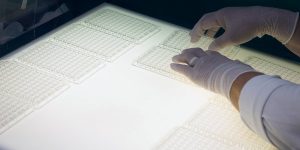 Injection-molded diagnostic microplates on a light table