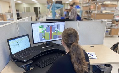 Engineer reviewing a medical device CAD model